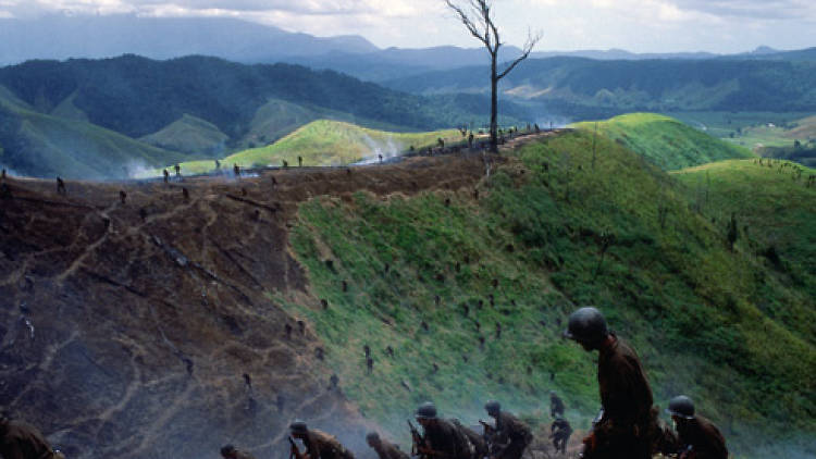 PARADISE LOST Soldiers take the hill.
