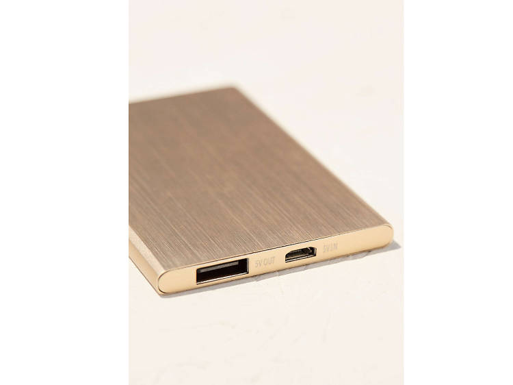 Slim rose-gold portable power charger Slim rose-gold portable power charger