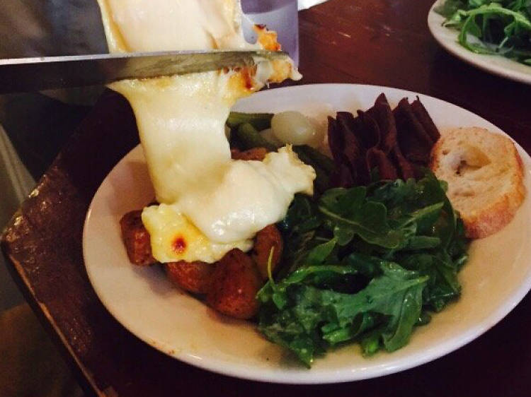 Dig into a face-melting dinner at Raclette