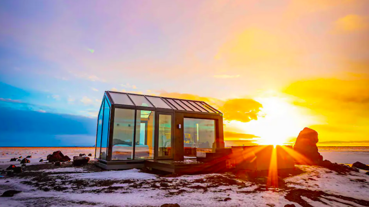 A cottage made of glass
