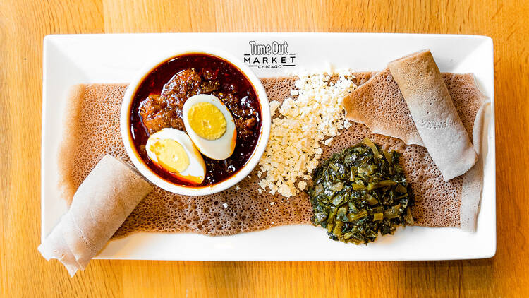 A plate of doro wot with injera.
