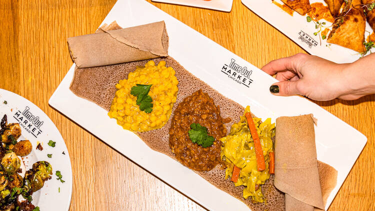 A plate of veggie messob.