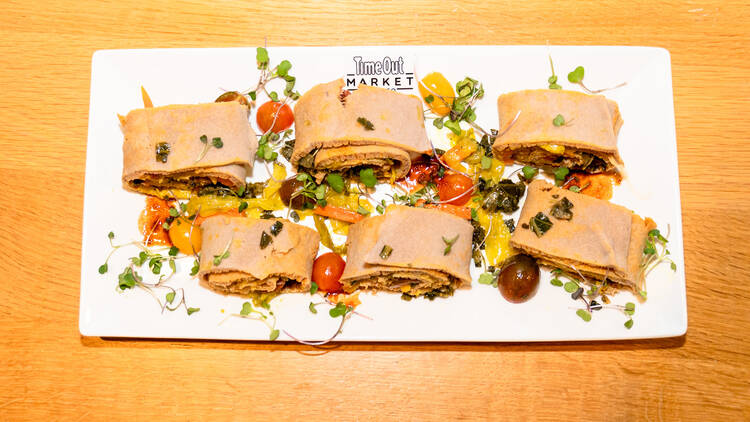 A plate of veggie rolls.