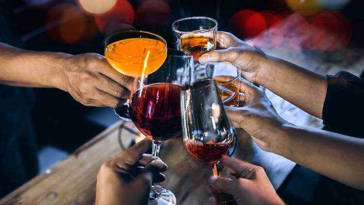 A group of friends having drinks at a nightclub.