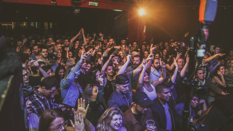 People dancing in a crowded club