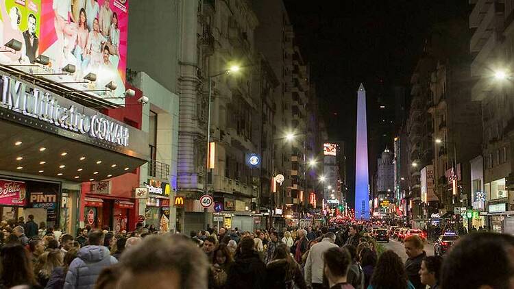 Go to the theater on Corrientes Street