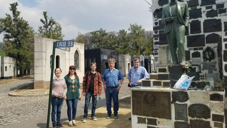 Singing "Mi Buenos Aires querido" in front of the remains of Carlos Gardel