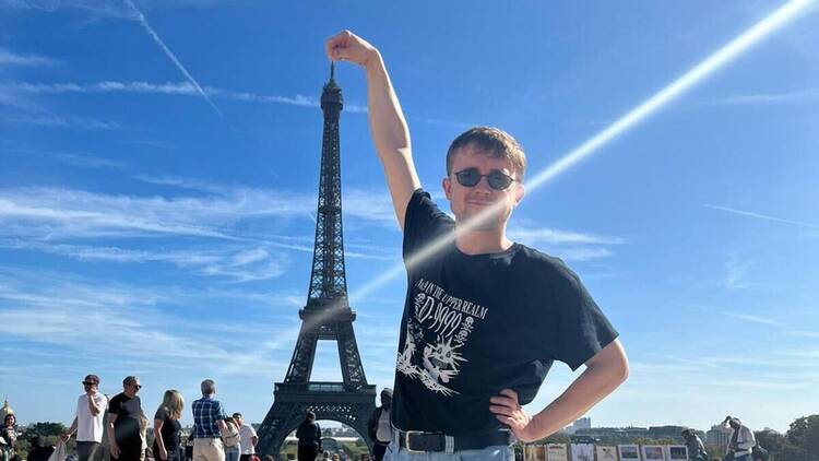 One of our editors taking a selfie at the Eiffel Tower