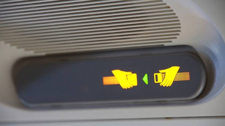 Seatbelt sign on aeroplane