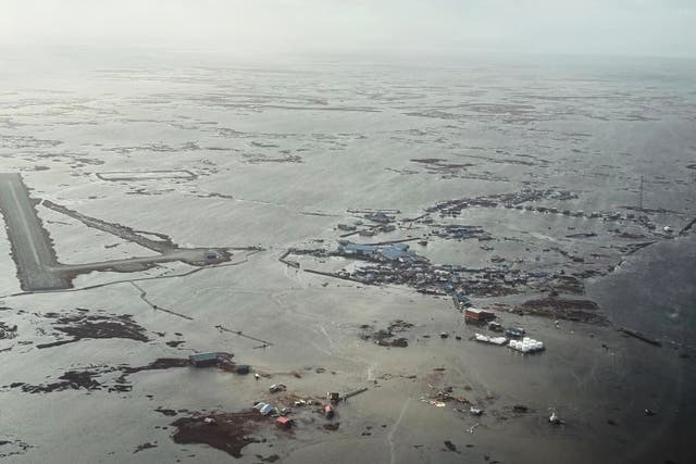 <p>In this photo provided by the Defense Visual Information Distribution Service, Alaska Air National Guard rescue personnel conduct a search and rescue mission in Kipnuk, Alaska.</p>