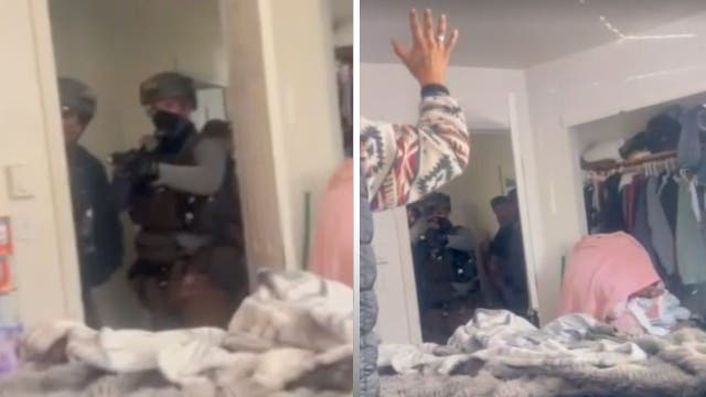 <p>ICE agents appear to point weapons at the family, including the mother, who was holding her 3-month-old baby, a viral video showed. </p>
