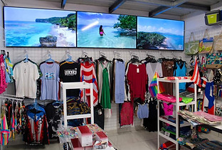 Souvenir shop featuring beachwear and souvenirs